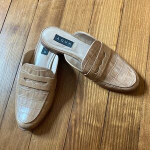 Aqua slides size 7. Embossed tan/camel leather. Gently worn.